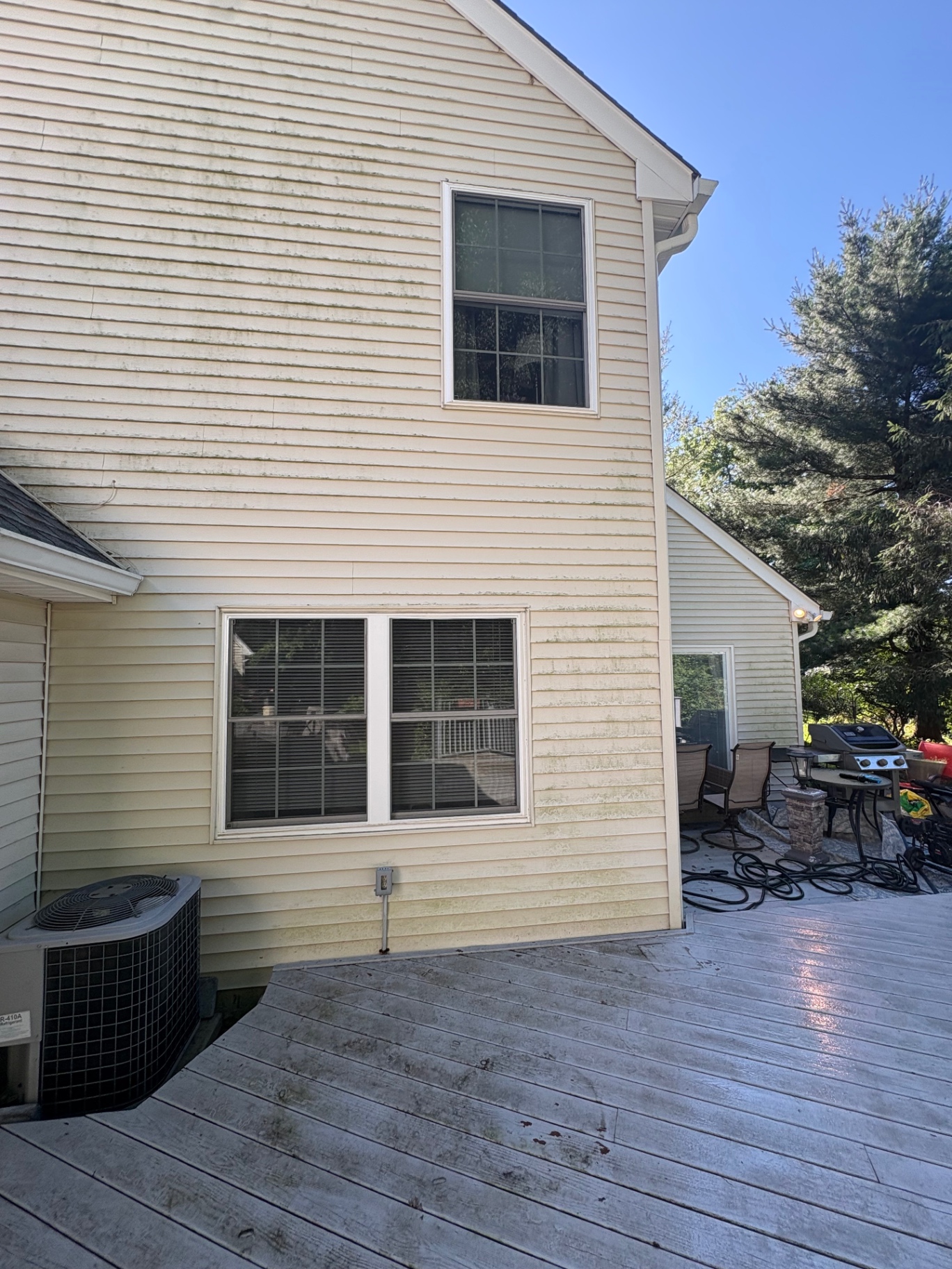 House wash vinyl siding before