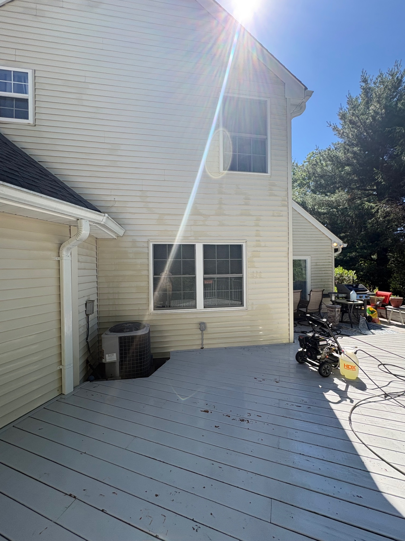 House wash vinyl siding after